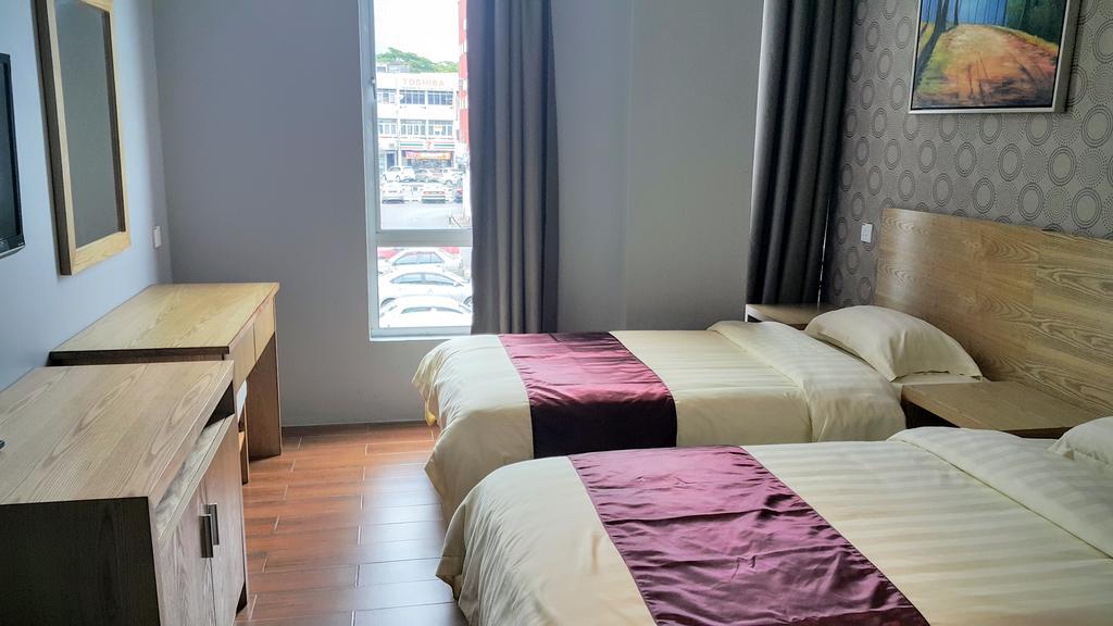 Residence 21 Boutique Inn Miri Bagian luar foto