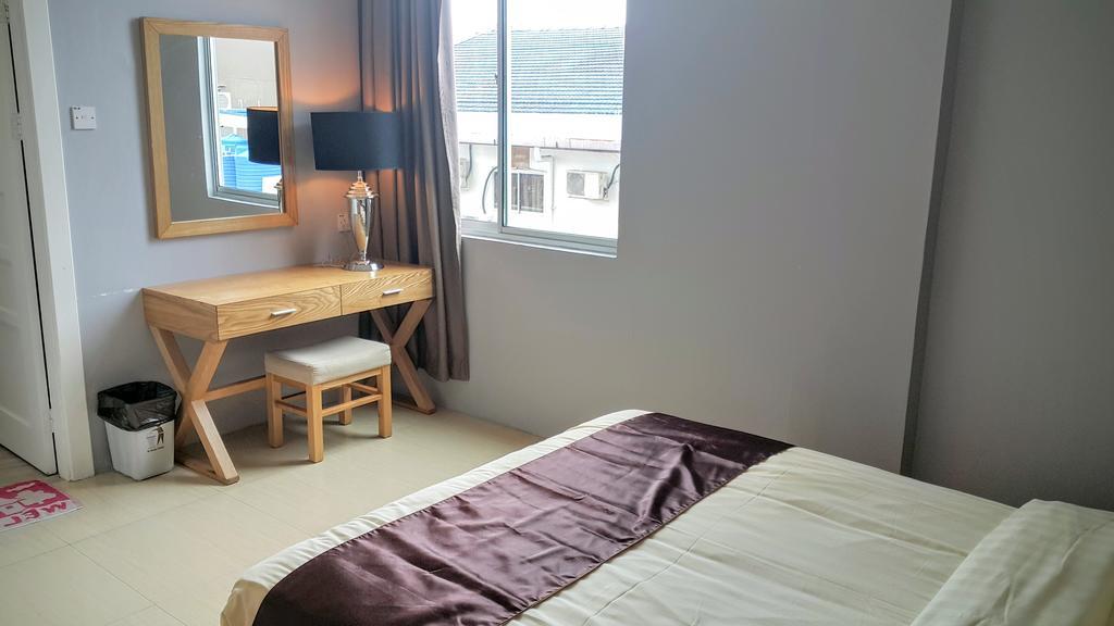 Residence 21 Boutique Inn Miri Bagian luar foto